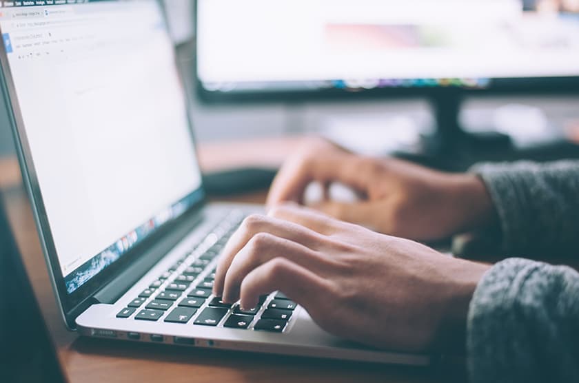 Picture of somebody using a laptop
